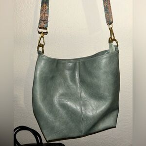 Boutique Crossbody with trendy guitar strap. Unbranded. NWOT